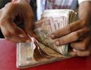 Rupee falls for 4th day vs dollar, eases 2 paise