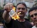 Greece imposes capital controls as crisis deepens