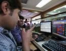 Sensex yo-yos ahead of CPI, IIP data; metal shares drag