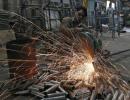 Factory activity growth slows to 5-month low in Feb