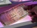 Rupee falls 5 paise against dollar, ends at 61.92