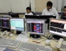 Sensex climbs higher on favourable cues; FMCG top gainer