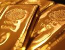 Gold extends losses; down Rs 100 on global cues, low demand