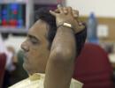 Sensex slumps over 500 points as China rattles global stocks