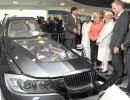 A day after biz meet in Delhi, Modi, Merkel visit Bosch facility