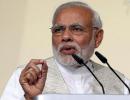 Modi says India won't join forex devaluation race to boost trade