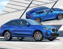 BMW X4 lords over other cars on the road