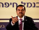 Adani Group to prepay $1.11 bn to release pledged shrs