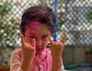 Taimur plays Holi!