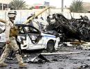 Car bombs rock Baghdad again; 127 killed