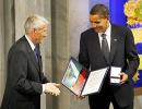 Obama receives Nobel Peace prize, justifies war