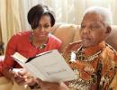 IMAGES: Michelle Obama's candid moments with the Mandelas