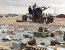 Libyan rebels take control of Ajdabiya, advance in Brega