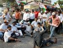 PIX: NCP workers take to the streets to protest attack on Pawar