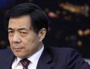 China suspends top leader over murder charges