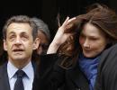 Sarkozy's fingers crossed as polls begin in France