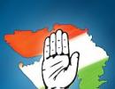 Congress woos Gujaratis with free laptops, 16 pledges