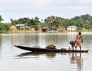 Pix: Flood victims in for tough days ahead in Assam