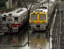 PHOTOS: Heavy rains in Mumbai; trains, flights delayed