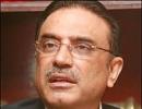 Pak court seeks Zardari's response on double role