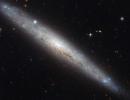 NASA captures pictures of dusty spiral galaxy