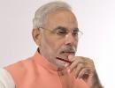 Modi wonders how FDI call came day after Sonia's US trip