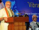 Modi woos Mamata on her turf; trains guns at Manmohan