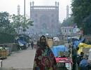 PHOTOS: Winter blast sends Delhiites shivering