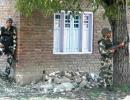 PIX: 3 militants, policeman killed in gunfight in Kashmir