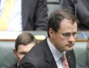 Aus Muslim minister racially abused for taking oath on Quran