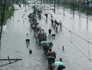 PHOTOS: Heavy rains lash Mumbai; hit rail, road traffic