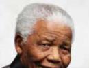 Mandela's health improves, breathes 'without difficulty'