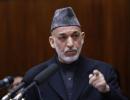 Karzai arrives in India; to seek military aid