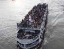 Bangladesh ferry capsizes after collision, at least 48 dead