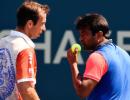 Paes, Sania toil before progressing at US Open