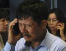 AirAsia QZ8501: Relatives of 162 passengers wait anxiously for news of missing plane