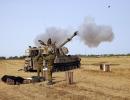 Gaza bombardment continues, Israeli tanks at border