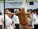 PHOTOS: Clinton meets students in UP village