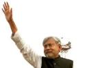 Modi says Nitish nursing PM ambitions, true secularism in Gujarat