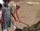 Modi cleans Assi Ghat, nominates UP CM, 8 others for Swachh Bharat