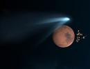 PHOTOS: Mountain-sized comet whizzes past Mars after a million years