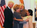 'New grandparents' Clintons keep their date with Modi