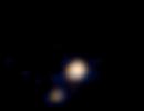 NASA probe clicks FIRST-EVER first colour image of Pluto