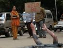 Help! Is this woman drowning in Bengaluru's pothole?