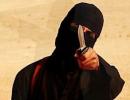 Jihadi John vows to return to Britain to 'carry on cutting off heads'