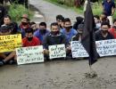 Defying curfew protesters in Imphal came out to streets to block roads