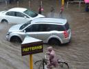 Nothing's gonna stop us now! Braving rain, Mumbaikars cycle to work