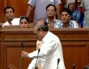 Uproar inside Delhi assembly: BJP MLAs break mike, tear papers