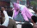 Woman smashes SP leader's car after his guard winked at her