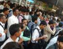 PHOTOS: Mumbai hassled with train delays, traffic snarls for second day